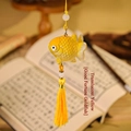 Lucky goldfish charm pendant in transparent yellow with elegant tassels and beads - Koi Tassel Pendant / Transparent Yellow