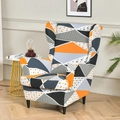 Modern geometric pattern wingback chair cover in orange, black and grey stretch fabric - Fashion Triangle
