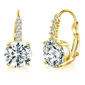 Detail view of gold hoop earrings featuring a large zircon main stone and small accent gems - Gold