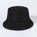 Detail of the black quilted bucket hat featuring diamond-pattern stitching and nylon texture - Adjustable / Black