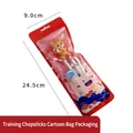 Blue toddler training chopsticks with yellow cat topper and red cartoon pouch - Dragon Training Chopsticks (Cartoon Bag)