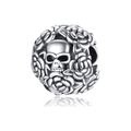Macro detail of silver skull charm bead with hollow rose texture and polished finish - Hollow Rose Skull