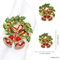 Christmas napkin ring with double bells, holly leaves and berries in gold finish - Double Bell Style 51