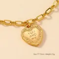 Ciondolo a cuore dorato in acciaio inox con incisione You and Me, 17x15mm - YOU AND ME Cuore / Oro