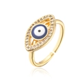 Detalle del anillo dorado de Ojo Turco con esmalte azul y circonitas engastadas - Abierto Ajustable / Azul