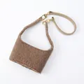 Brown teddy fleece coffee cup sleeve with portable leather handle and gold metal hooks - Camel