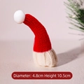 Mini red knitted Santa hat decoration with white pompom, measures 4.8cm by 10.5cm - Pointy Hat Style