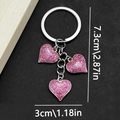 Pink glitter heart keychain with golden edges and three charms on a silver chain - Enamel Pink Heart Style (ER412)