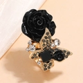 Vintage style gold-plated ring featuring a large black rose and rhinestone butterfly design - Black