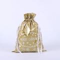 Close-up of golden Christmas drawstring gift bag with reindeer and snowflake patterns - 51*39 Gold Text