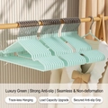 Pack of 10 light green non-slip seamless clothes hangers with metal hooks for drying - Nordic Green (Standard 40g)