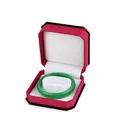Octagonal red and black jewelry box with a polished green gemstone bangle inside - Bracelet Box / Bordeaux With White Interior