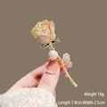Golden crystal rose brooch with pearl and sparkling diamonds for women, 7.9cm x 2.5cm size - Gold