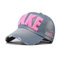 Close-up of pink chenille FAKE embroidery and distressed denim texture on baseball cap - Adjustable / Pink