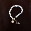 Irregular freshwater pearl bracelet with peach pendant and gold-tone lobster clasp - Sweet Pearl Pink Peach Pendant Style