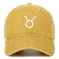 Mustard yellow washed cotton baseball cap with white Taurus constellation embroidery - Yellow
