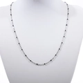 Elegant stainless steel necklace with black bead accents on a white model bust - 40+5cm / Steel + Black