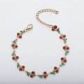 Detail of 18k gold stainless steel chain with glitter cherry pendants and lobster clasp - Gold + Red