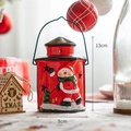 Rote 13cm Weihnachtslaterne mit Weihnachtsmann Motiv und sternförmigen Ausschnitten - Weihnachtsschneemann Tragbare Laterne