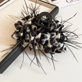Elegant shark hair claw clip featuring black feathers and leopard print fabric design - Black and White Leopard Print / Black
