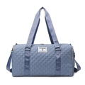 Sac de voyage bleu clair matelassé avec texture en losanges et bandoulière réglable - Bleu Brumeux