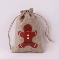 Weihnachts-Jutebeutel mit Kordelzug und Lebkuchenmann-Motiv auf rustikalem Leinenstoff - Lebkuchenmann