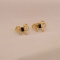 Detail of golden double-layer bow earrings with a square black stone in center - Gold Bow Black Zirconia / Black