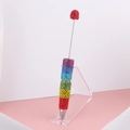 Penna con strass arcobaleno e punta in cristallo rosso su supporto in acrilico - Penna Arcobaleno