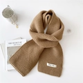 Thick brown knitted scarf for winter warm accessories in soft minimalist aesthetic - Camel