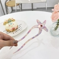 Close-up of pink marbled acetate starfish hair pin with sparkling center rhinestone - Transparent Purple Blue - Rhinestone Seastar Style