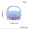 Blue silicone scalp massager brush measuring 9.5cm long and 7cm high weighing 83g - Handheld Wheat Straw Blue