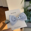 Detail of light blue cotton bow hair tie with oval accent and bead on branded card - Blue Single Bowknot Hair Tie
