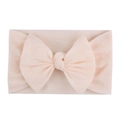Soft nylon infant headband featuring a large light pink bow for baby girls' cute accessory - Flesh Pink