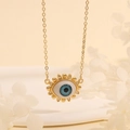 Macro detail of the evil eye pendant featuring blue iris and sparkling zircon stones - Blue Rays-G2