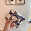 Detail of grey floral cotton linen coin purse with simple wish label and braided zipper pull - Grey White Floral