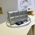 Quilted silver metallic shoulder bag with grid padding and sleek adjustable strap - Silver