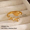 Adjustable golden stainless steel ring with leaf charm and three clear cubic zirconia gems - Bohemian Leaf