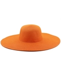 Detail of orange woven straw sun hat showing the wide brim and fine braided texture - M (56-58cm) / Orange