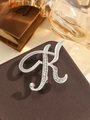 Elegant silver-toned letter K brooch with sparkling rhinestones in cursive style - Silver Letter K