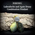 Labradorite and druzy agate pendant with gold-plated trim on natural wood display - Natural Labradorite Druzy Combination Pendant