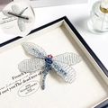 Handmade dragonfly hair clip featuring iridescent crystal beads and silver spring clip - Duckbill Hair Clips