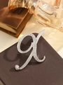 Elegant silver letter A brooch with sparkling rhinestones on vintage leather background - Silver Letter X