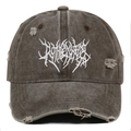 Close-up of distressed charcoal grey baseball cap with white embroidery and frayed details - Coffee
