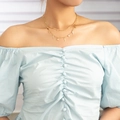 Double-layered gold necklace with star and lightning pendants on female model - Gold Lightning Star (NZ1273)