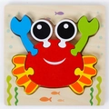 Children's 3D wooden crab puzzle with vibrant marine themed colors and matching base - Crab with Buckle