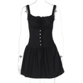 Close-up of black mini dress with ruched chest, decorative buttons, and front tie details - S / Black