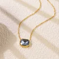 Detail of elegant gold chain necklace featuring a rectangular dark blue faceted gemstone - Deep Blue Rectangular Style (BD025-blue)
