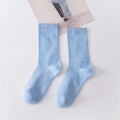Vibrant light blue cotton mid-calf socks with ribbed texture on a white background - Blue Gray