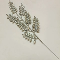 Detail shot of silver glitter coated decorative leaf spray for holiday home arrangement - Silver