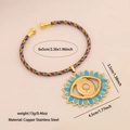Bracciale intrecciato con pendente occhio di sole dorato e smalto blu, peso 13g - 2# Bracciale Blu